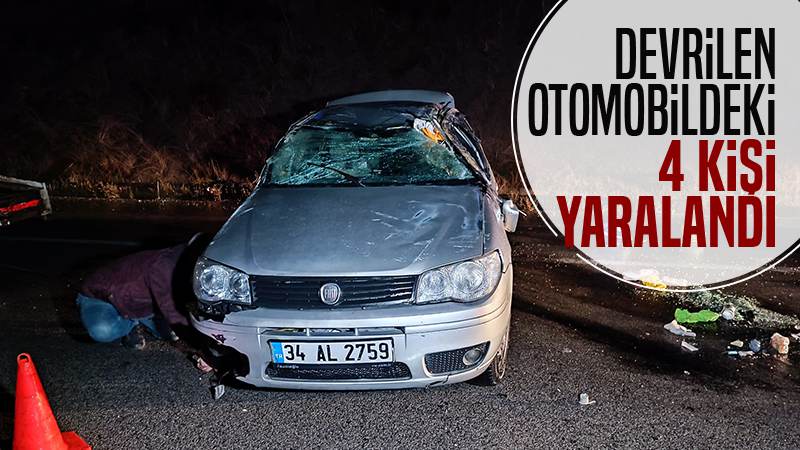 Devrilen otomobildeki 4 kişi yaralandı