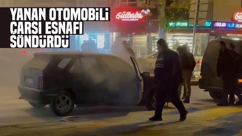 Yanan otomobili, çarşı esnafı söndürdü