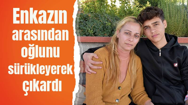 Enkazın arasından oğlunu sürükleyerek çıkardı 