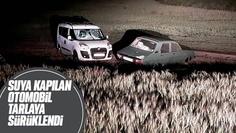 Suya kapılan otomobil tarlaya sürüklendi 
