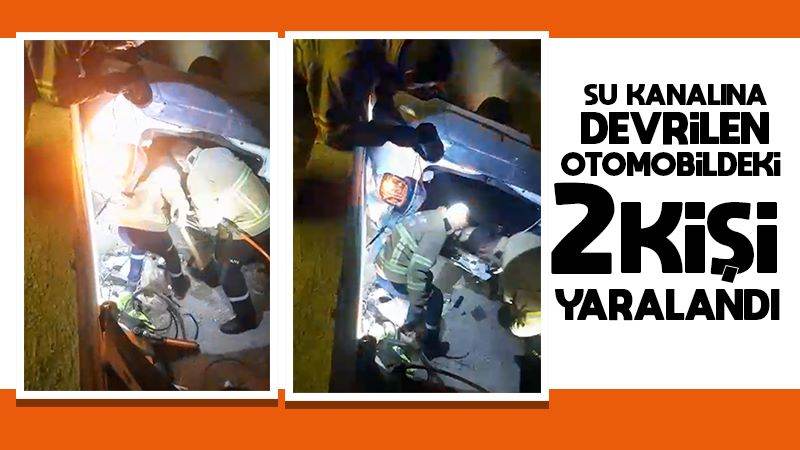 Su kanalına devrilen otomobildeki 2 kişi yaralandı
