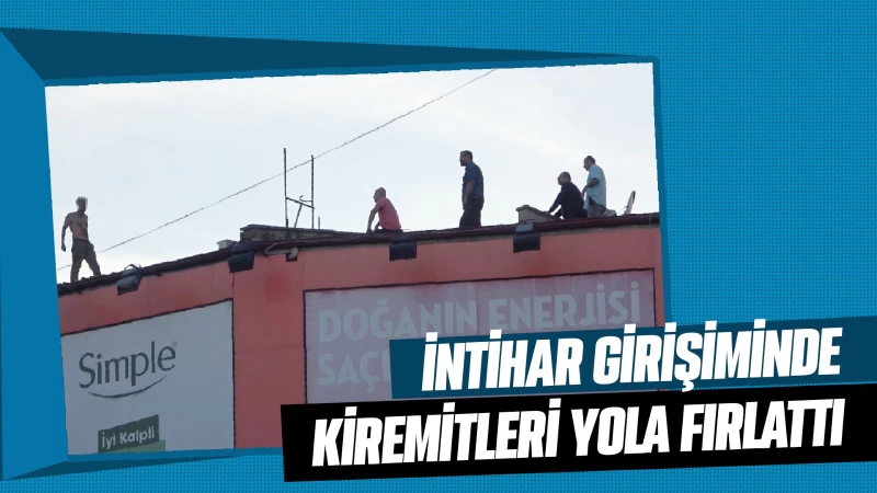 İntihar girişiminde kiremitleri yola fırlattı