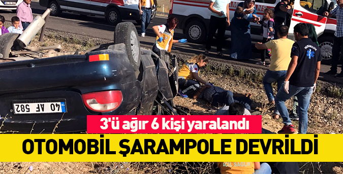 Otomobil devrildi