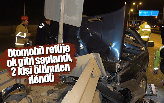 Otomobil refüje ok gibi saplandı, 2 kişi ölümden döndü