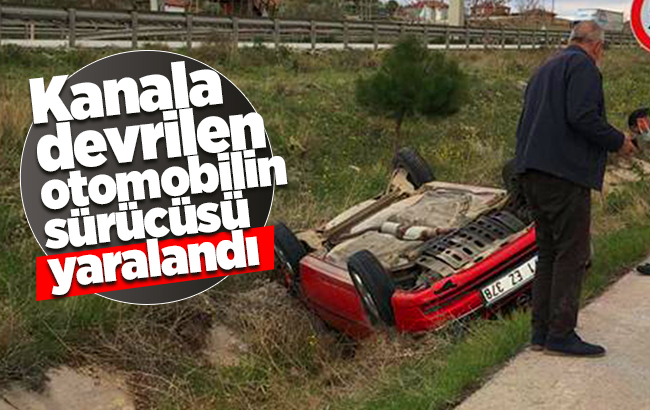 Kanala devrilen otomobilin sürücüsü yaralandı