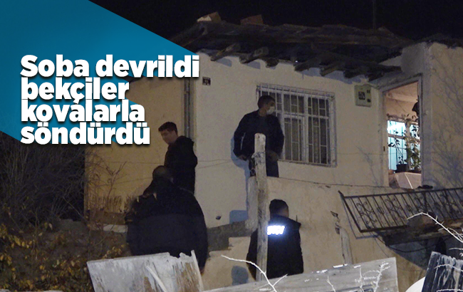 Devrilen soba odayı yaktı, bekçiler su kovalarıyla söndürdü