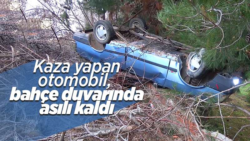 Kaza yapan otomobil bahçe duvarında asılı kaldı: 3 yaralı