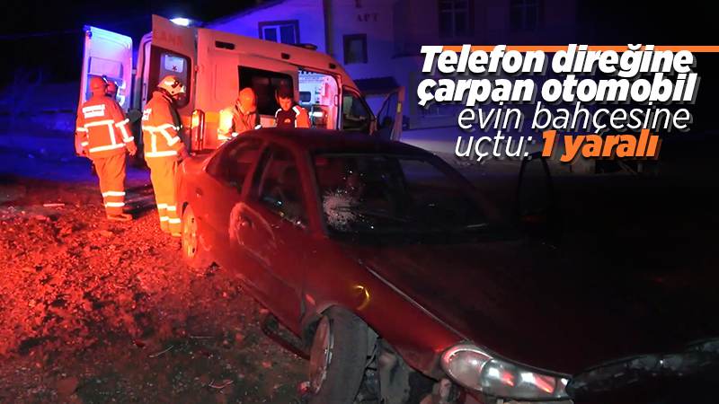 Telefon direğine çarpan otomobil evin bahçesine uçtu: 1 yaralı