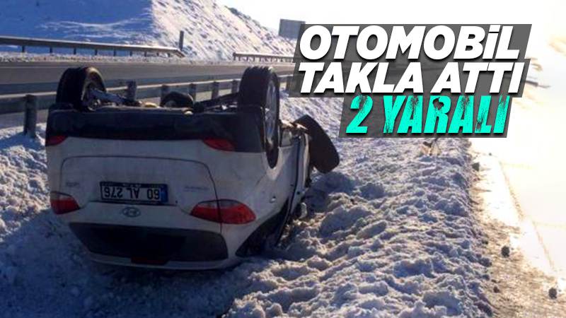 Karlı yolda kayan otomobil takla attı